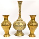 A pair of Eastern brass baluster vases,