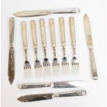 An electroplated set of six forks and five fish knives.