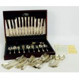 ELKINGTON; a cased six setting canteen of electroplated cutlery comprising table knives,