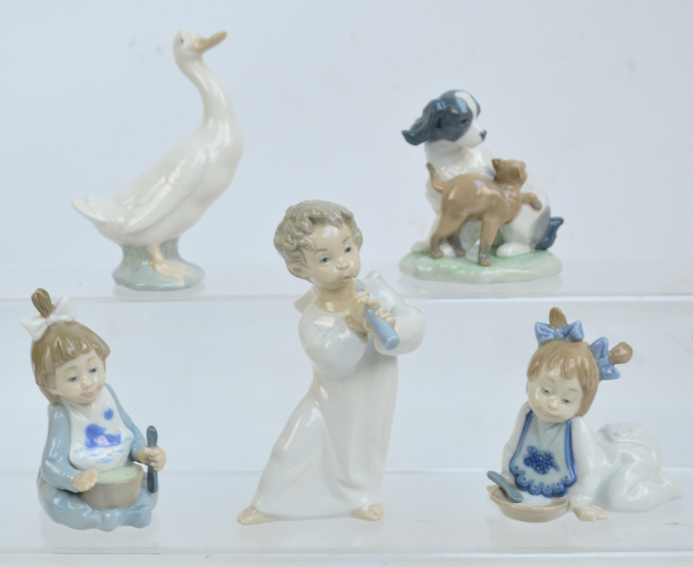 Four Nao figures comprising a goose, a dog playing with a cat,