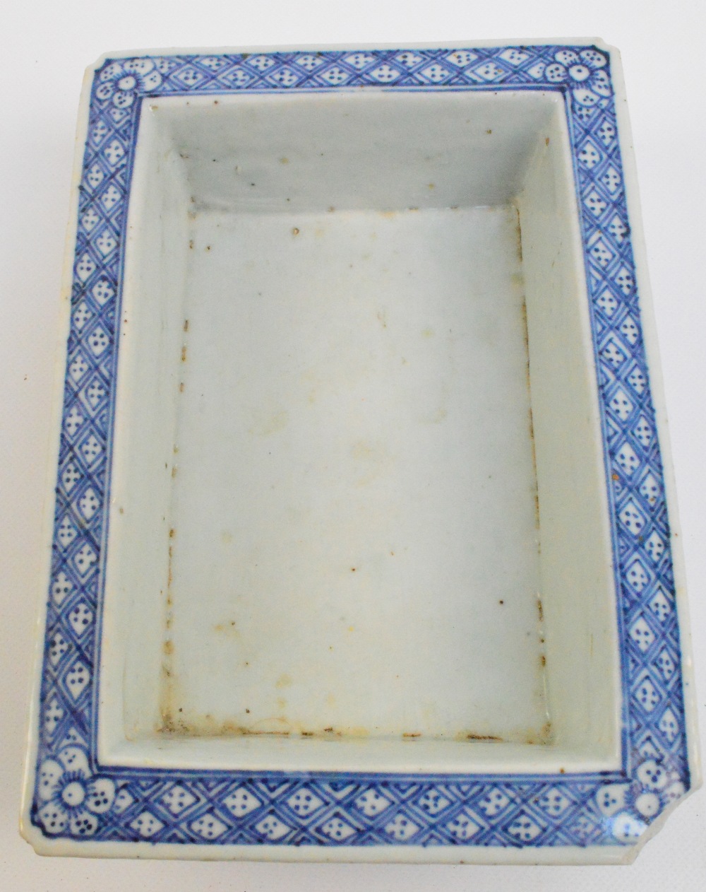 A 19th century Chinese blue and white porcelain double walled rectangular dish with pierced outer - Image 2 of 5