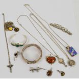 A small quantity of costume jewellery including a silver hinged bangle,