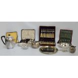 A collection of silver plated items including a three piece tea service, a circular platter,