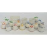 A collection of ten Lladro Christmas bells and four further examples, a pair of small flower pots,