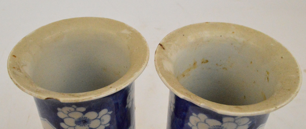 A pair of 19th century Chinese porcelain sleeve vases painted in underglaze blue with two opposing - Image 2 of 2