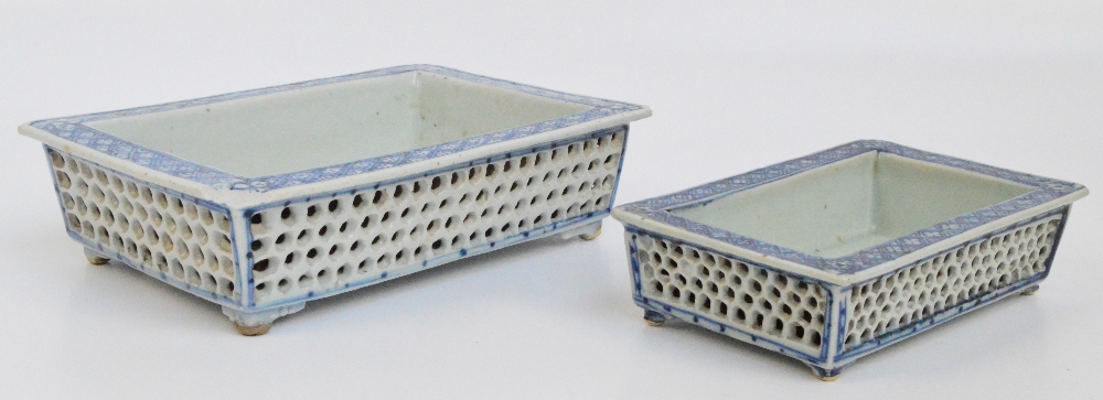 A 19th century Chinese blue and white porcelain double walled rectangular dish with pierced outer