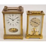 A 20th century Estyma eight day brass carriage clock and a Schatz eight day carriage clock,