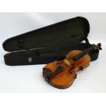 A full sized German violin, Stradivarius copy, with two-piece back, length 36.