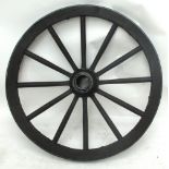 A 20th century European wooden twelve spoke cartwheel with metal trim, diameter approx 84cm.