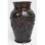 A Japanese bronze vase of baluster form with flared rim,