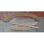 Six unused beech wood rockers for chairs and a mahogany doorway or window arch (7).