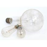 A very large vintage light bulb, length approx 30cm.