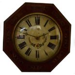 A mahogany cased postman's alarm clock of octagonal form,