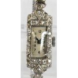 A lady's white metal diamond set Art Deco cocktail watch,