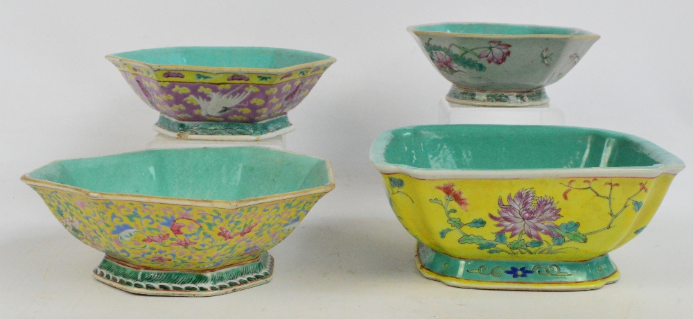 Four Chinese shaped footed bowls with turquoise glaze to interior,