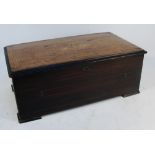A late 19th century Swiss cylinder musical box playing twelve airs and striking on a drum,