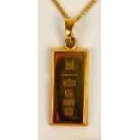 An Elizabeth II 9ct yellow gold rectangular ingot pendant, Royal Mint Classics,