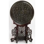 A large Chinese bronze circular mirror, probably late Ming,