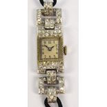 An Art Deco platinum and diamond cased manual wind lady's cocktail wristwatch,