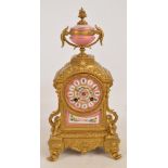 A late 19th century French gilt spelter and porcelain mounted mantel clock,