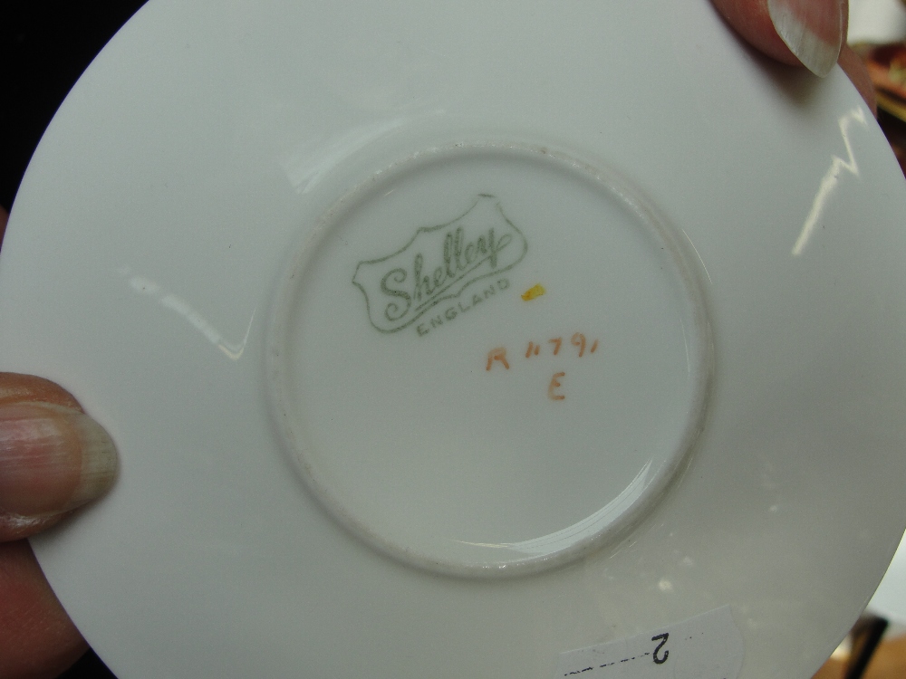 An Art Deco Shelley cup and saucer in the "Shelley Mode Yellow Blocks" pattern and a Carlton Ware - Image 3 of 3