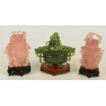 Two similar Chinese carved rose quartz vases with covers,