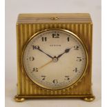 An early 20th century gilt metal carriage clock, the circular silvered dial inscribed Zenith,