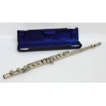 A Besson "Embassy" white metal flute, the mouthpiece stamped "Sterling", cased.