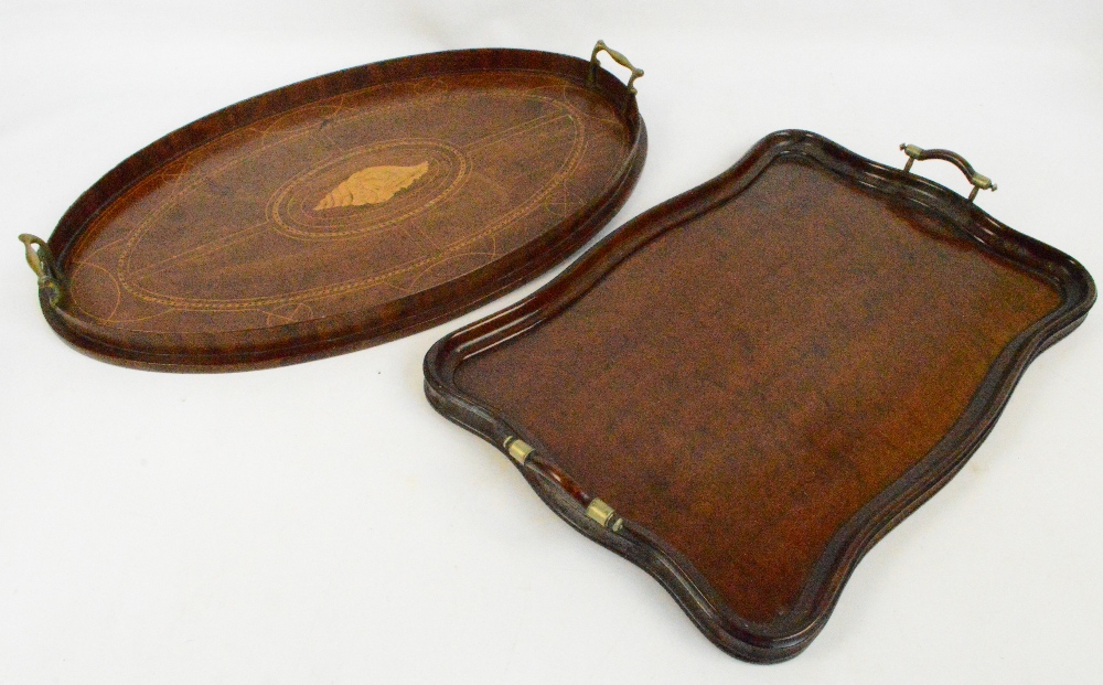 An Edwardian mahogany and inlaid twin handled oval tray,