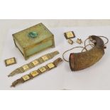 A brass mounted green hardstone trinket box of rectangular form with pierced hinged lid centred