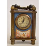 A miniature late 20th century Omega carriage clock,