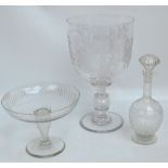 A large Victorian clear glass trophy shaped vase with Victorian coin set into knop, height 37cm,