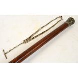 A malacca shafted and white metal capped walking cane and a graduated watch chain with T-bar (2).