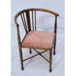 An Edwardian beech corner chair of small dimensions with string inlay,