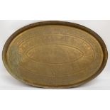 A large Eastern brass oval tray,