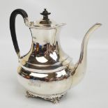 A George V hallmarked silver coffee pot of rounded form, initialled "A&MN", Atkin Bros,