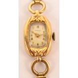 MERIT; an Art Deco 14ct yellow gold cased manual wind lady's cocktail wristwatch,
