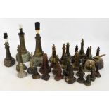 A large collection of serpentine and other polished stone lighthouses.