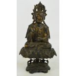 An 18th/19th century Chinese bronze figure of seated Buddha holding a cup in left hand,