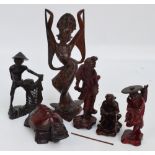 Six 20th century Oriental carved wooden figures.
