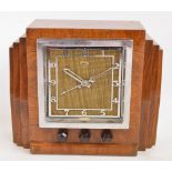 An Art Deco walnut cased Radiochron, with Arabic numerals to the square dial,