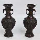 A Japanese Meiji period near pair of bronze lobed baluster vases,