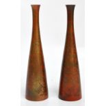 A pair of Japanese patinated metal bottle vases of slender tapering form, character marks to base,