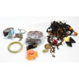 A quantity of costume jewellery including necklaces, bangles, beads, etc.