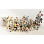 A collection of early 20th century Continental porcelain figures, a cherub adorned sleigh,