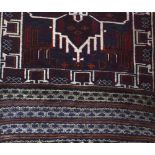A Middle Eastern hand-knotted rug.