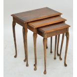 An oak nest of three tables on cabriole legs with pad feet, largest 55.5 x 30cm.