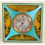 A French silver enamel decorated and metal set strut clock,