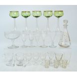 A collection of predominantly 19th century drinking glasses including a set of five green tinted