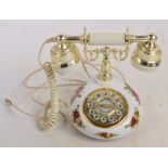 A Royal Albert "Old Country Roses" pattern ceramic phone with simulated rotating dial, height 18.